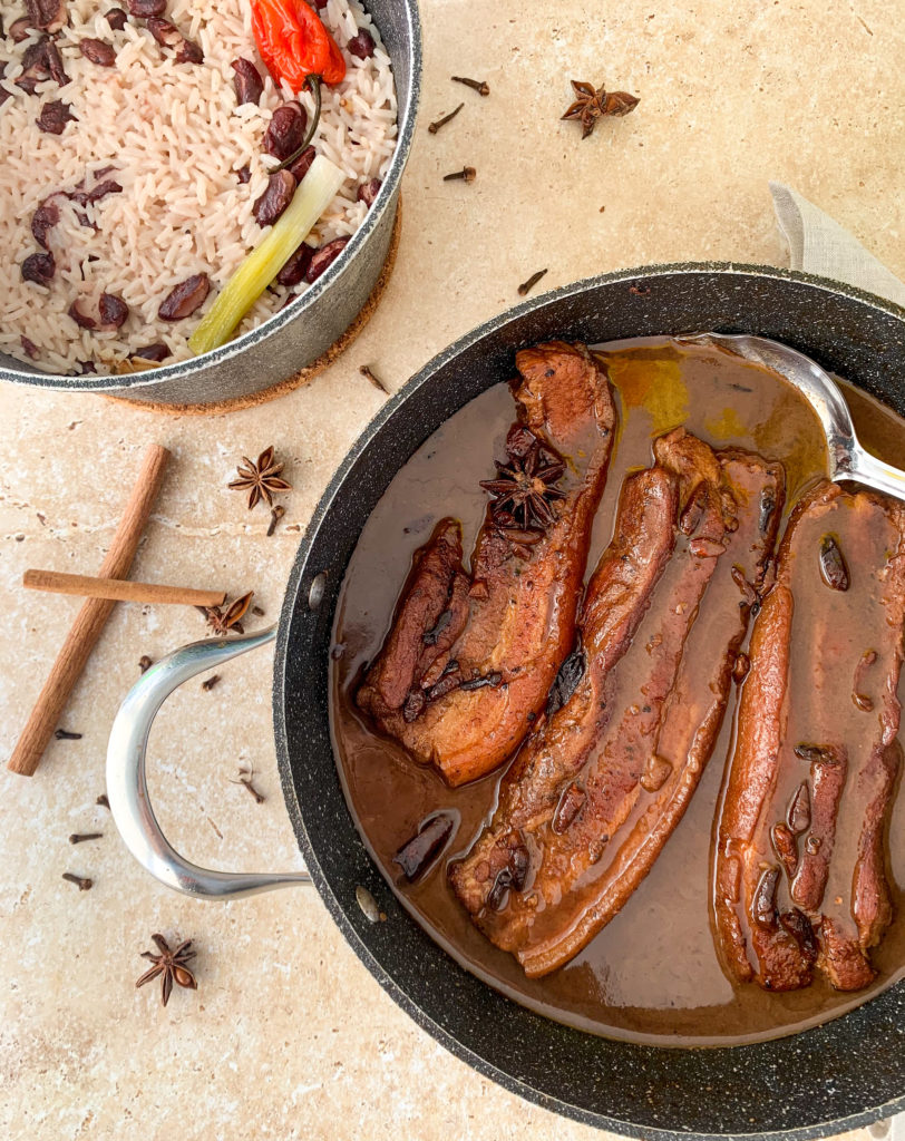 braised pork belly and rice and peas