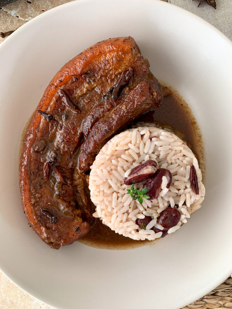 braised pork belly and rice and peas