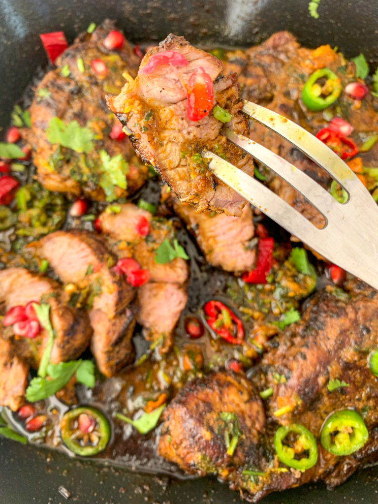 close up chilli and coriander lamb steaks