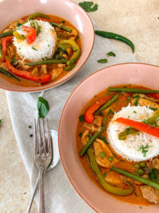 close up thai red curry plated