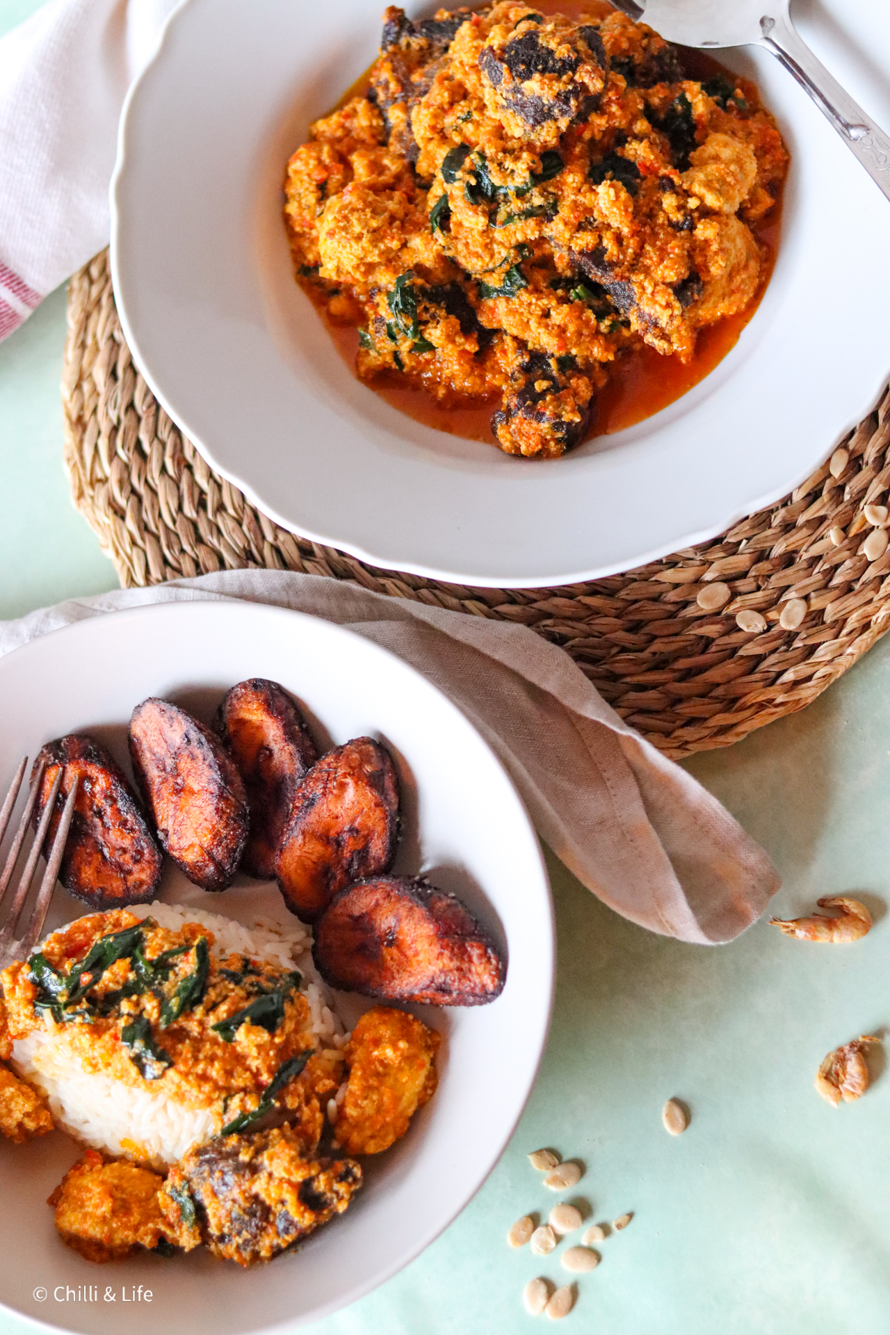 Nigerian egusi soup with white rive and fried plantain