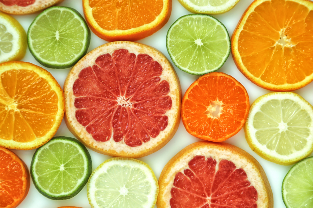 cut slices of citrus fruit orange lime blood orange